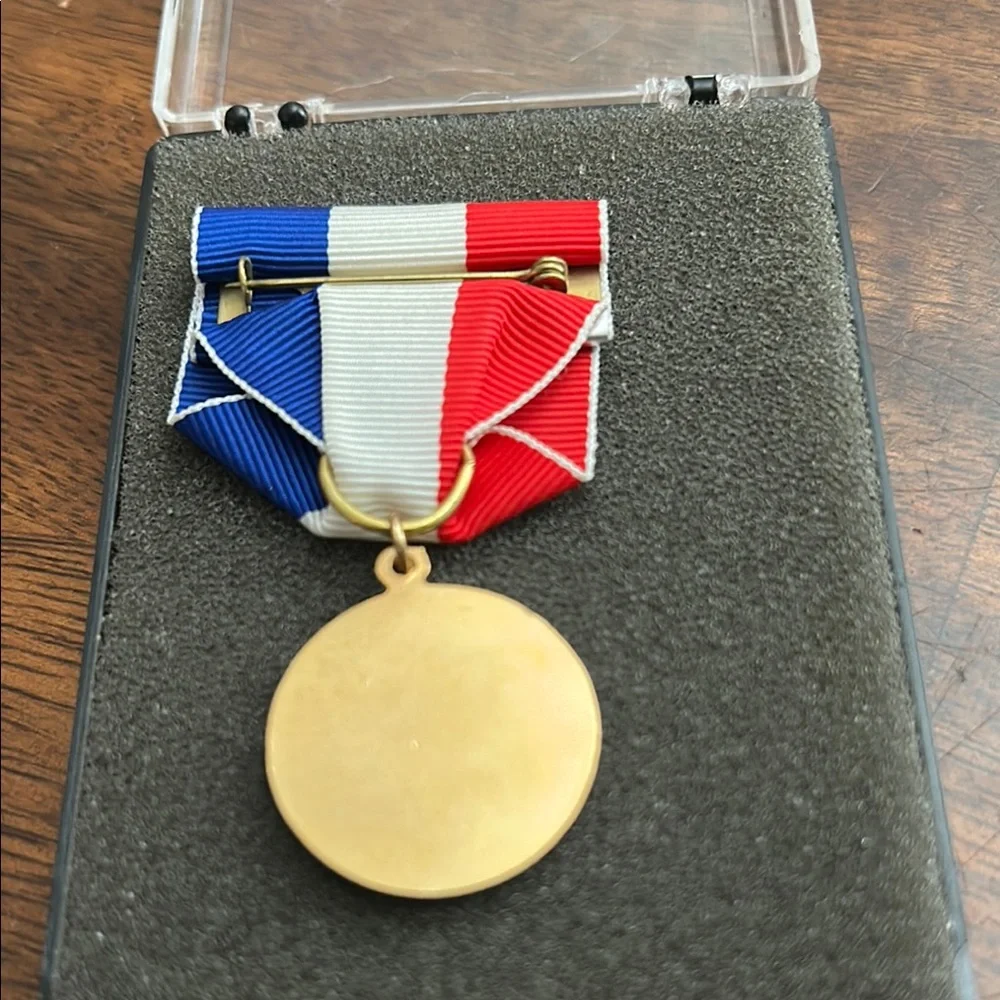 Gold Medal with Red, White, and Blue Ribbon Natinal Patriots Medal